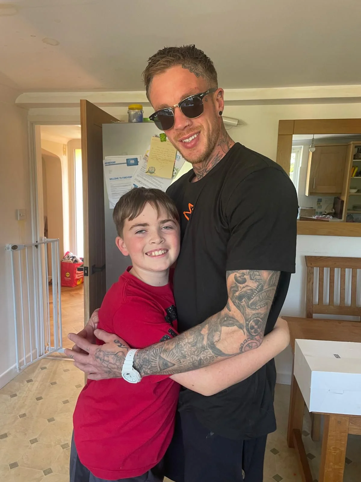 Kid and father hugging